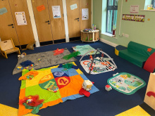 Burnley group set up, baby mats on the floor and toys 