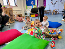 Image shows babies and toddlers playing
